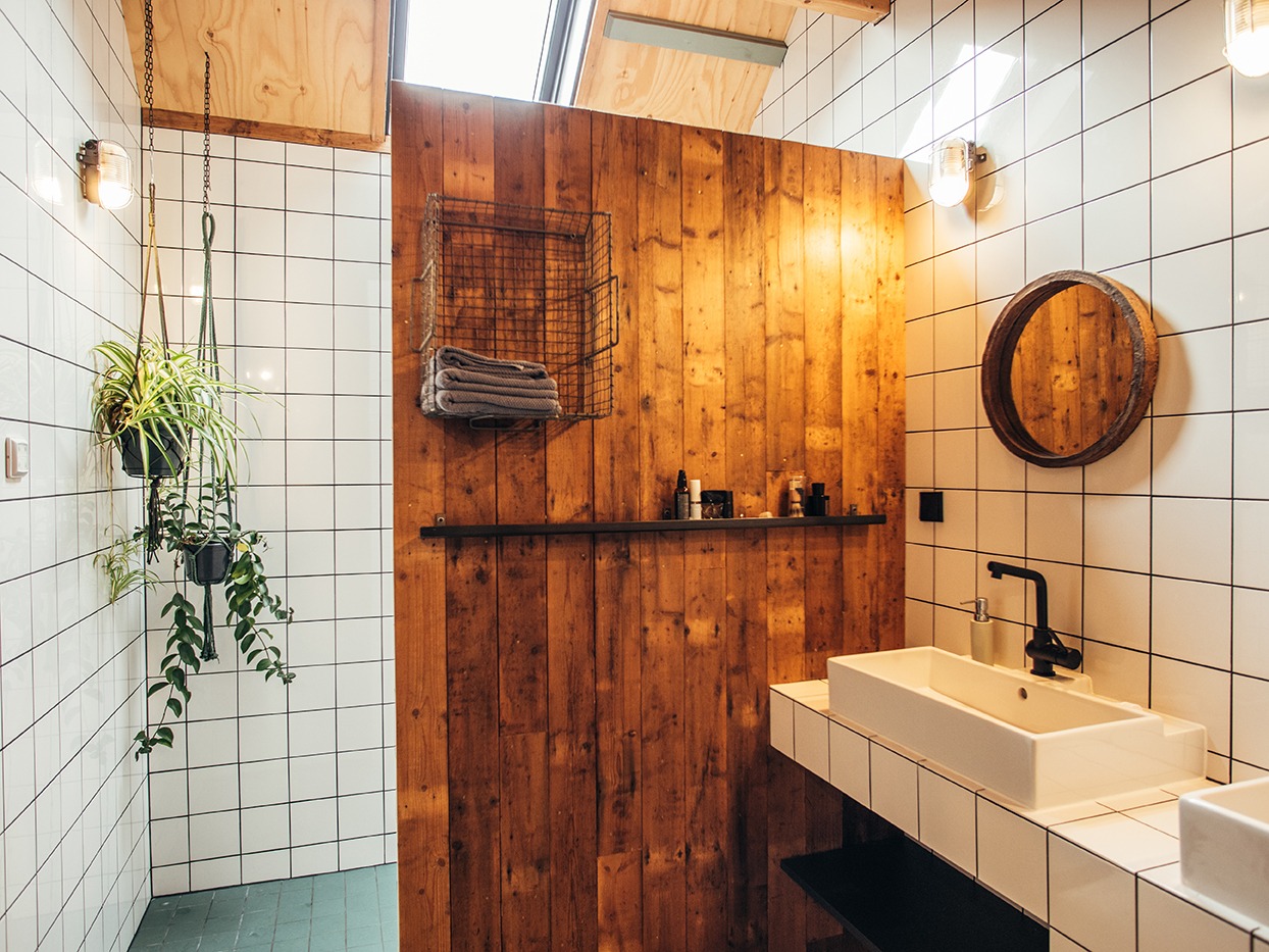 Interior of a midcentury modern bathroom in boutique hotel style